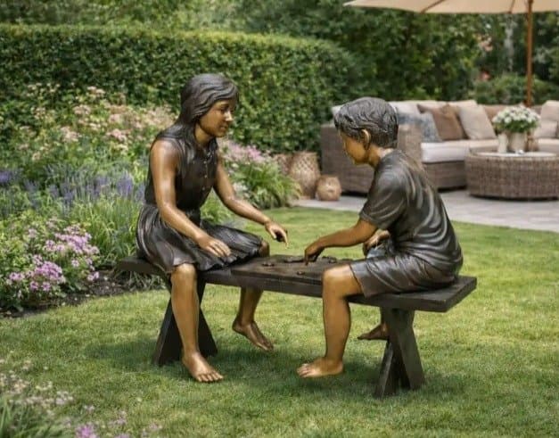2 children playing chess — Bronzartes luxury furniture at Gloria, Iraq