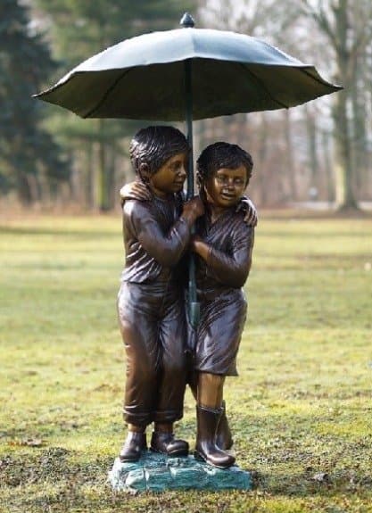 Boy And Girl Under Umbrella — Bronzartes luxury furniture at Gloria, Iraq