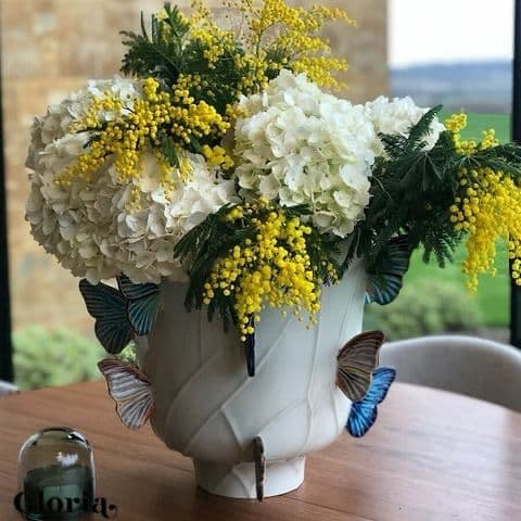 White butterfly vase with hydrangeas